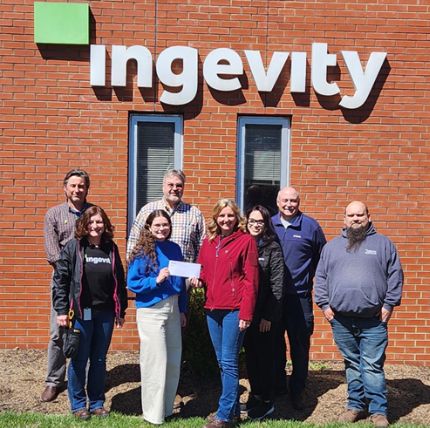 Employees in front of the Ingevity office